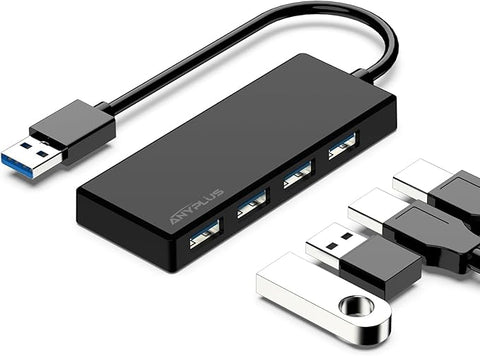 Black USB hub with multiple ports on a white background