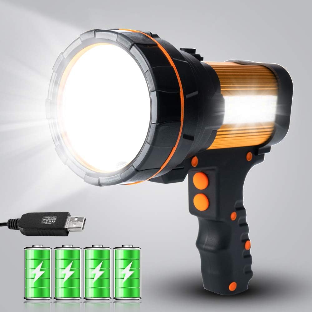 Black and orange flashlight with batteries and USB cable on a gray background