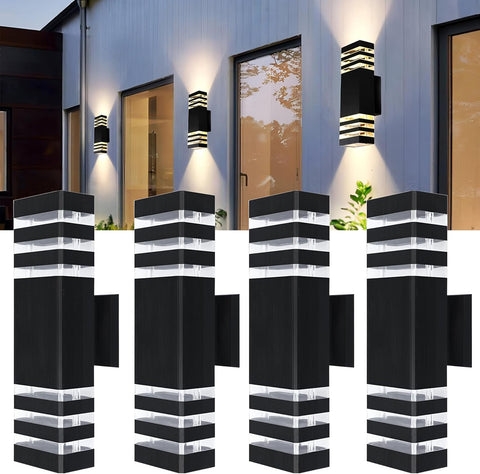 Black and white outdoor wall lights on a building exterior.