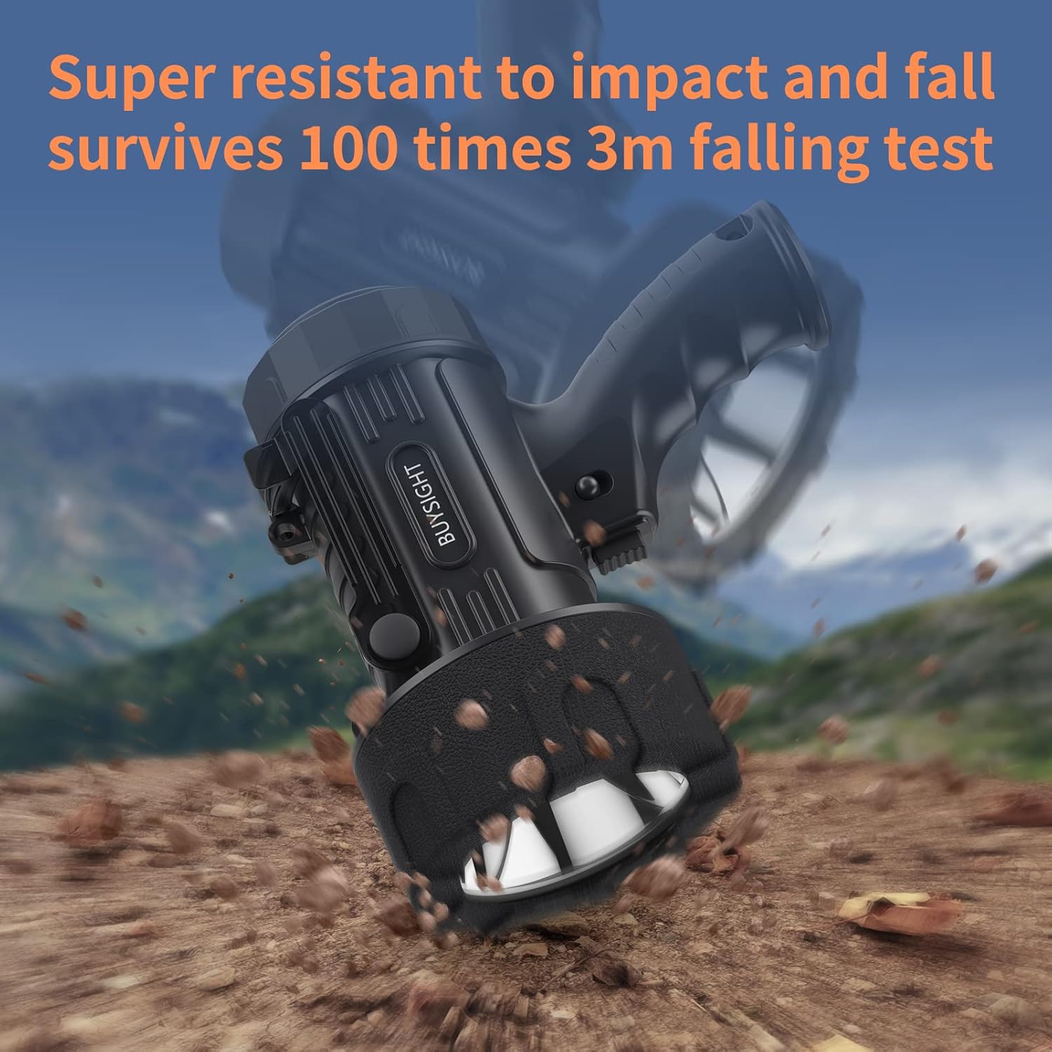 Black flashlight being dropped on a mountainous background with text about its durability.