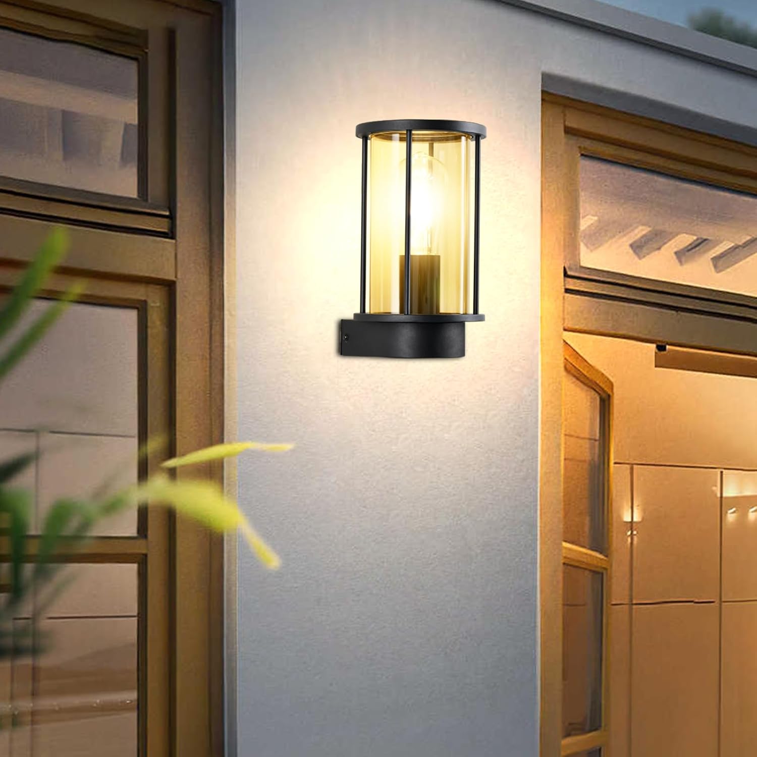 Black outdoor wall light fixture on a building exterior.