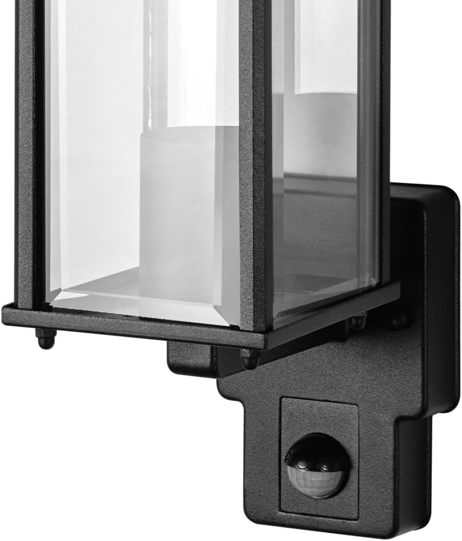 Black outdoor wall light fixture with clear glass cover on a white background