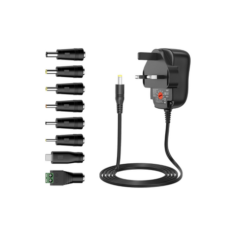 Black power adapter with multiple connectors on a white background