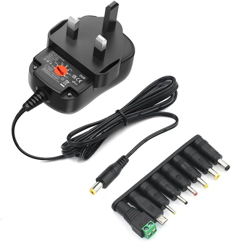 Black power adapter with multiple plug heads on a white background