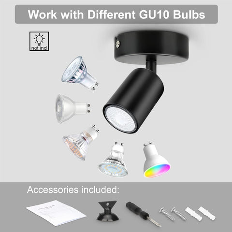 Black spotlight with GU10 bulbs and accessories on a gray background