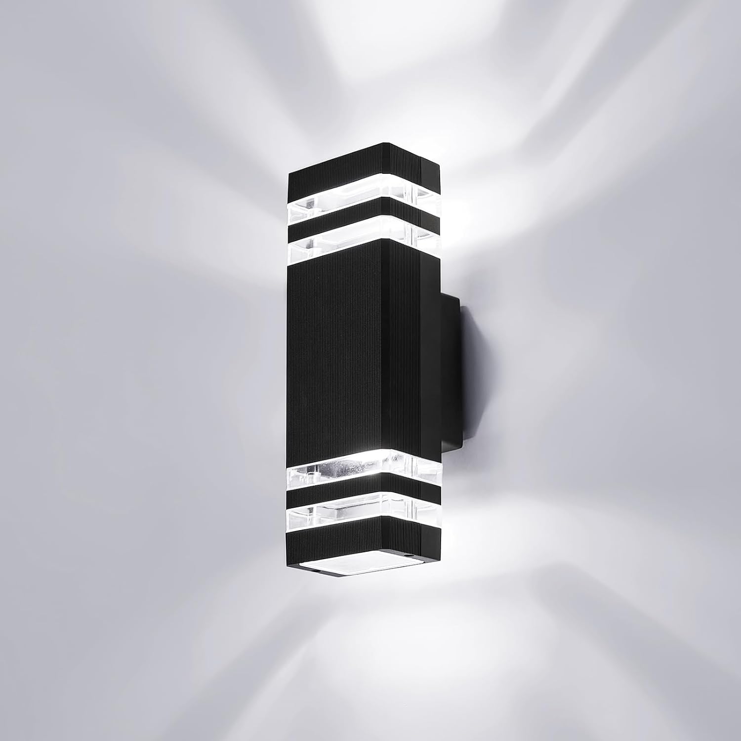 Black wall-mounted LED light fixture on a white background