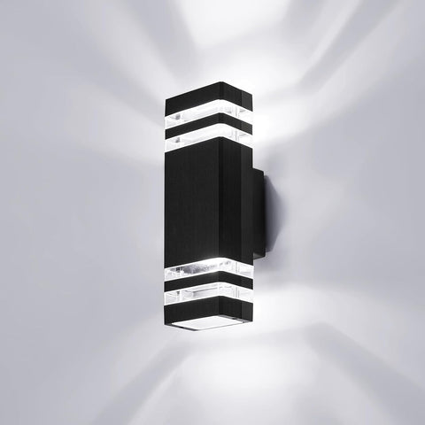 Black wall-mounted LED light fixture on a white background