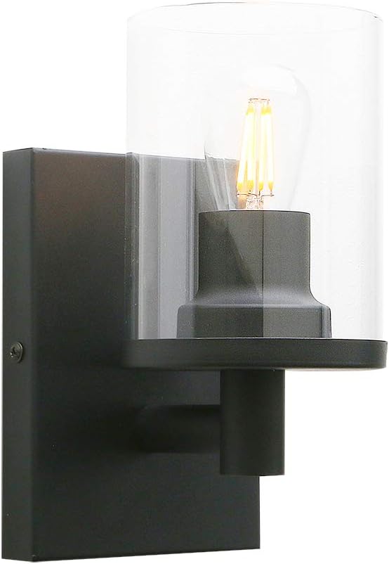 Black wall-mounted light fixture with a clear glass cover and visible bulb inside.