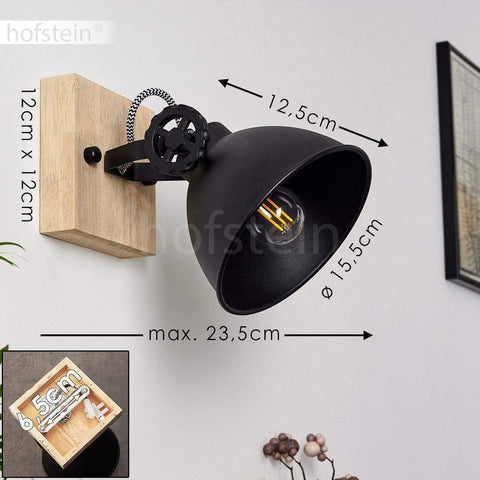 Black wall lamp with wooden base and measurements on a light gray background