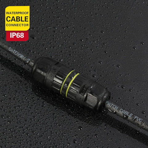 Black waterproof cable connector with IP68 rating on a wet surface