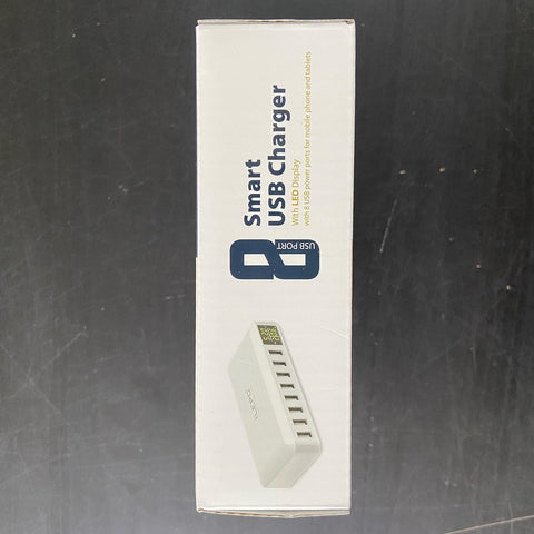 Box of a smart USB charger on a dark surface