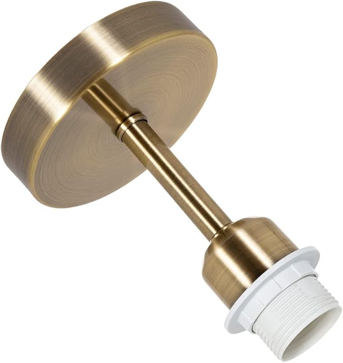 Brass shower head with white washer on a white background