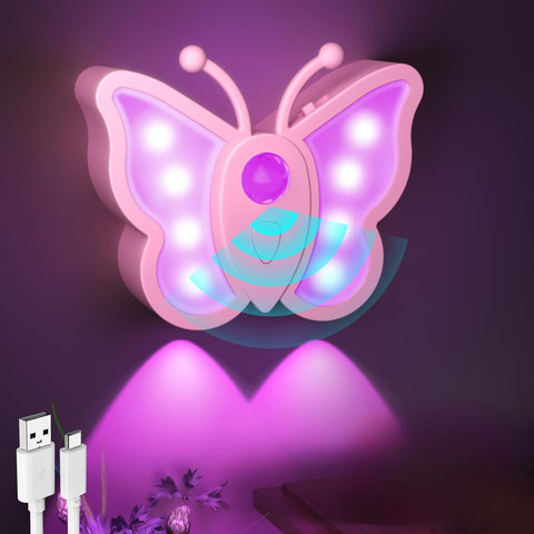 Butterfly-shaped night light with USB cable on a dark background
