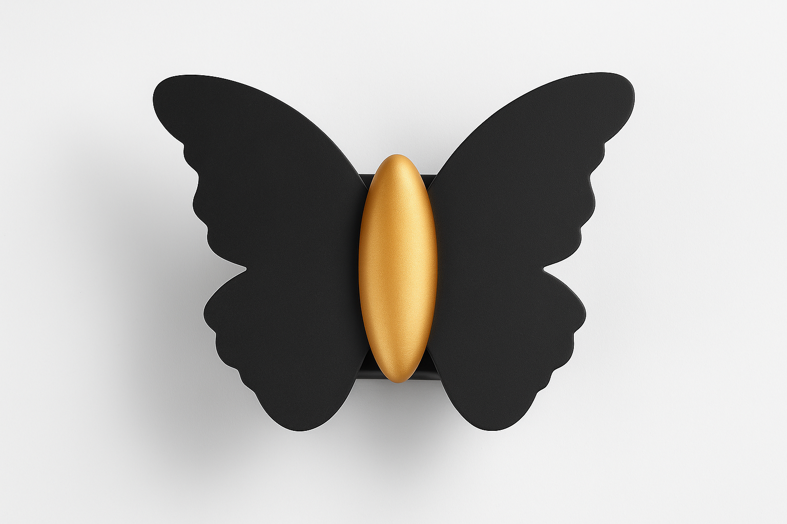 Butterfly-shaped object with a gold center on a white background