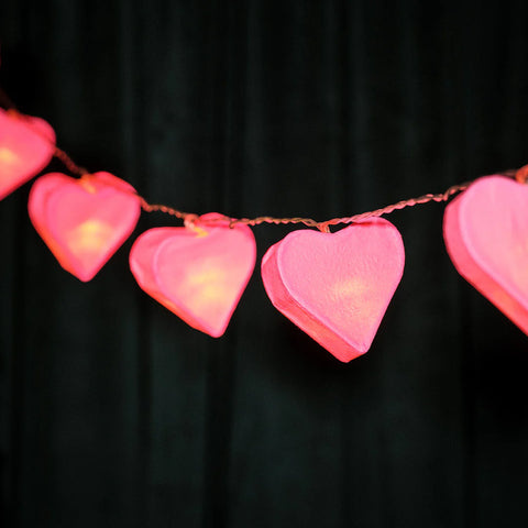 Battery-powered heart fairy lights in bedroom


