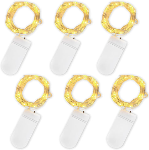 20 LED warm white battery operated fairy lights on copper wire glowing softly

