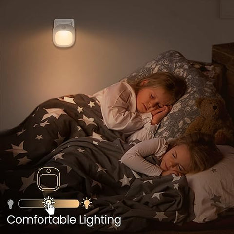 Dual-pack LED night lights displayed on table

