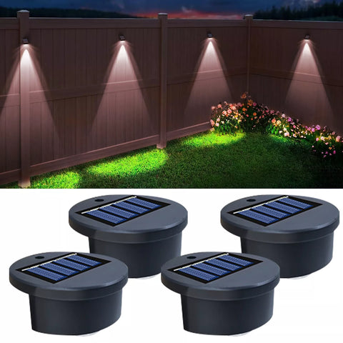 Solar wall lights providing security lighting for a garden.


