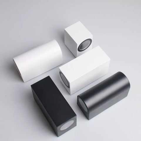 White Alpha Lights Modern PVC Wall Light mounted on a porch exterior

