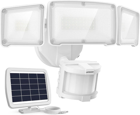 Solar-powered LED security light on a pathway with dusk-to-dawn automatic lighting

