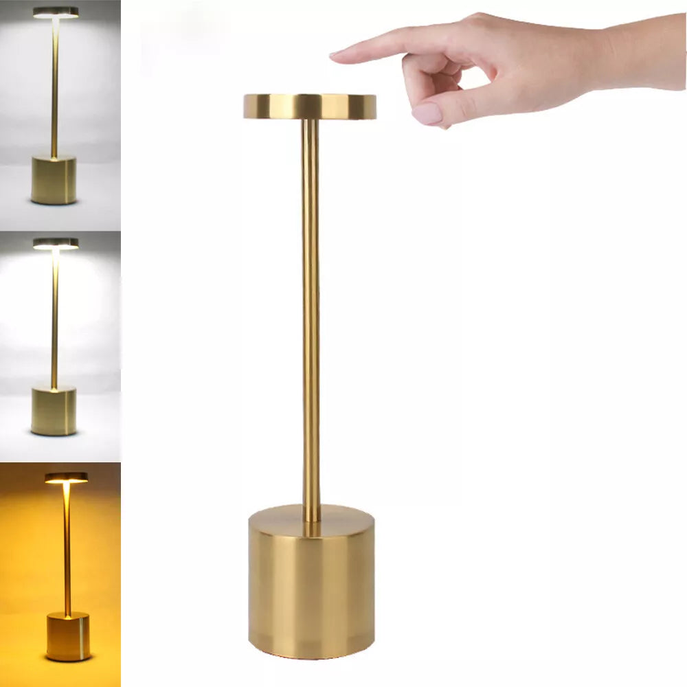 Lamp placed on an office desk illuminating a workspace.​

