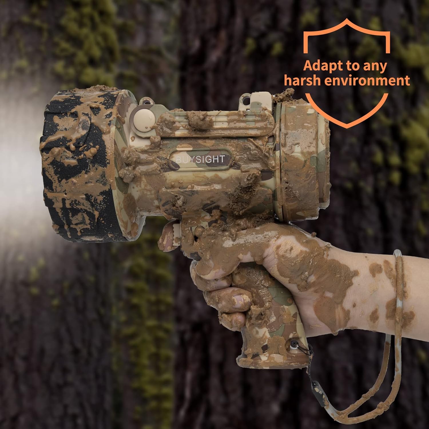 Camouflage device held by a hand with a forest background, featuring the brand 'V Sight'.
