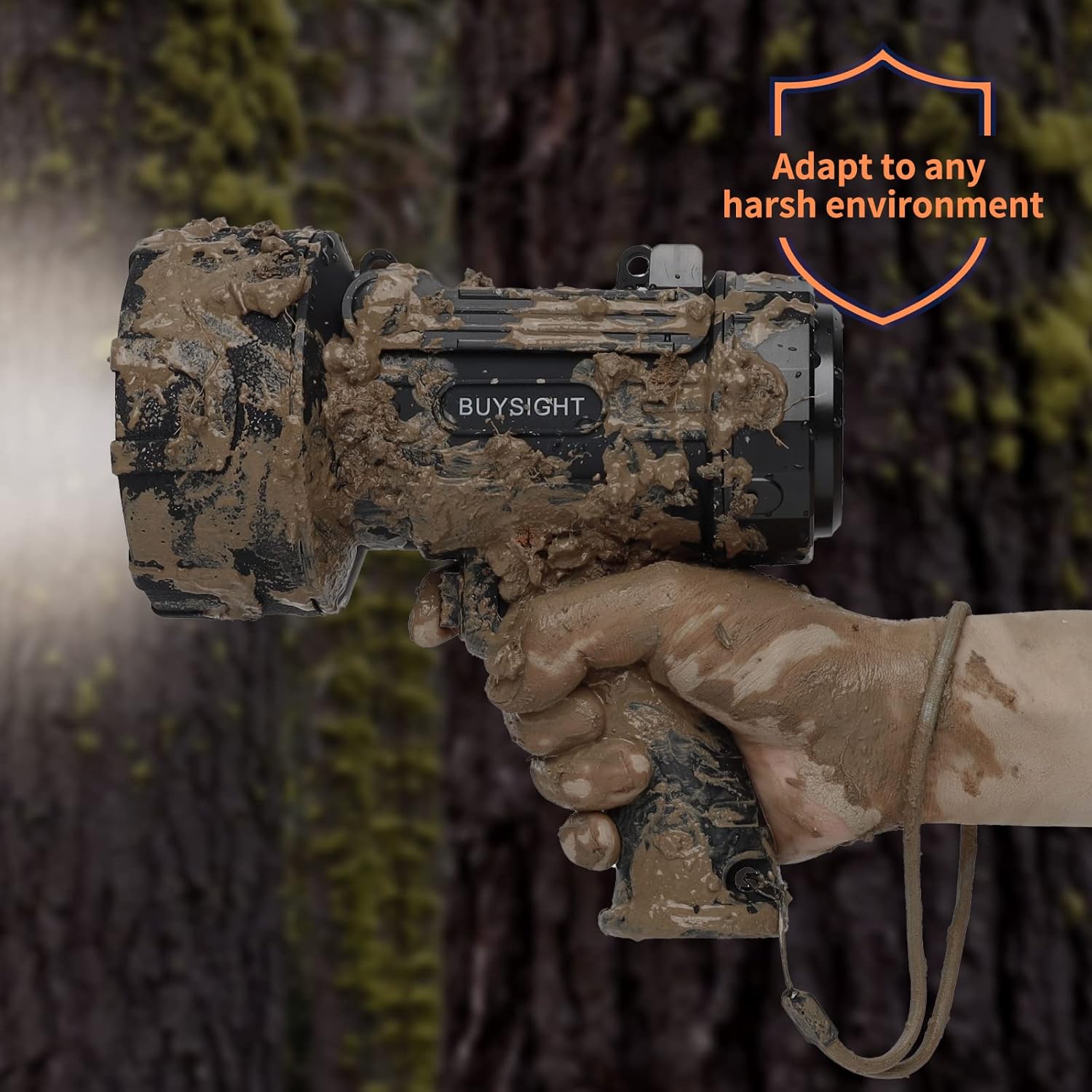 Camouflage device with 'Buysight' branding held by a hand against a natural background