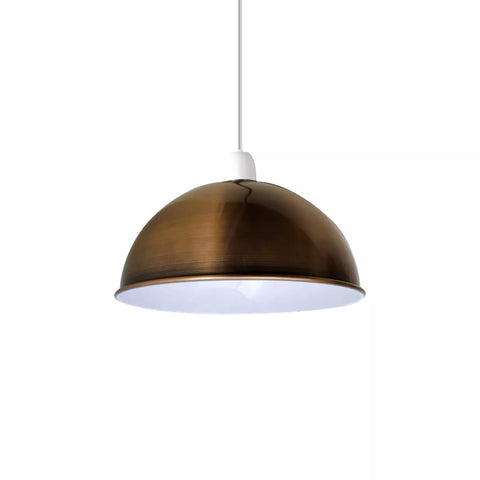 Copper dome pendant light adding warmth to a rustic kitchen

