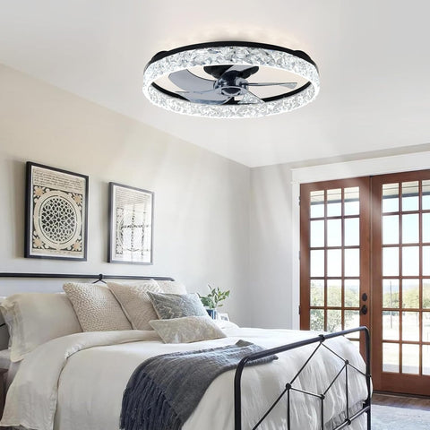 Ceiling fan with light fixture in a bedroom setting