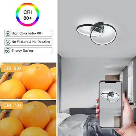 Ceiling light fixture with a smartphone showing a light bulb icon, surrounded by images of oranges to demonstrate color accuracy.