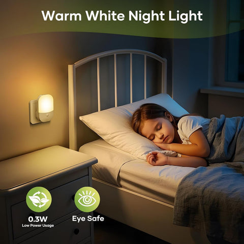 Child sleeping in a bedroom with a warm white night light on the wall.