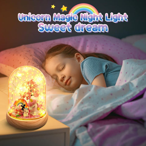 Child sleeping with a unicorn-themed night light on a nightstand.