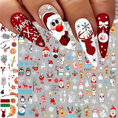 Christmas-themed nail art stickers with Santa Claus, snowmen, and reindeer on a gray background.