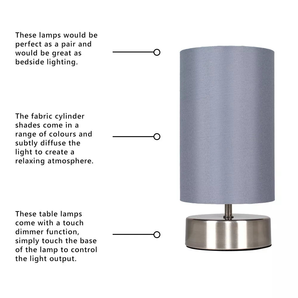 Elegant LED touch table lamp with fabric shade – suitable for UK bedside use.


