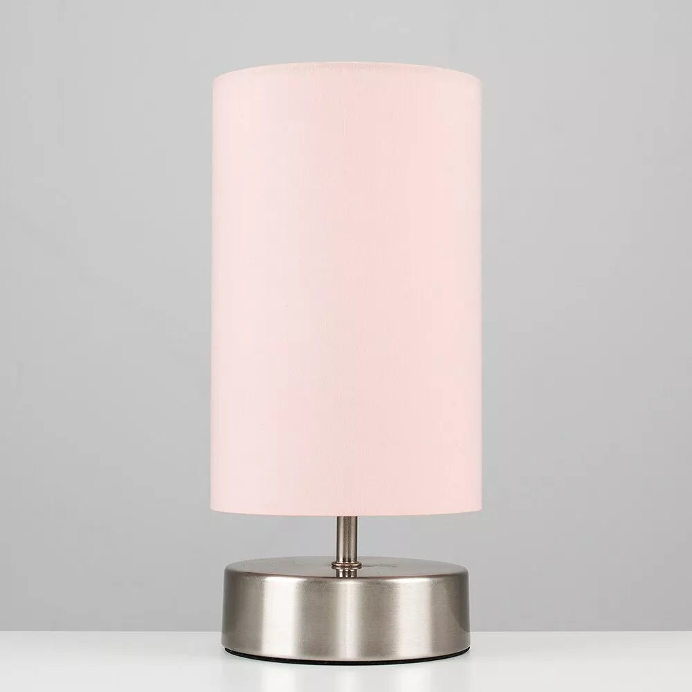 Chrome LED touch lamp placed on a contemporary desk workspace – UK decor.

