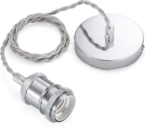 Chrome metal lamp with cord on a white background