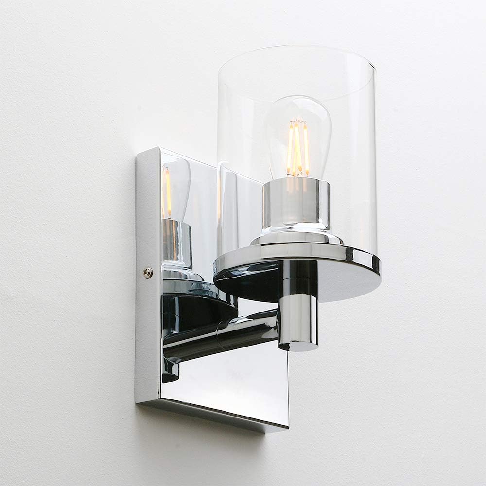 Chrome wall sconce with glass shades on a white background