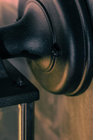 Close-up of a black metal object with a blurred background