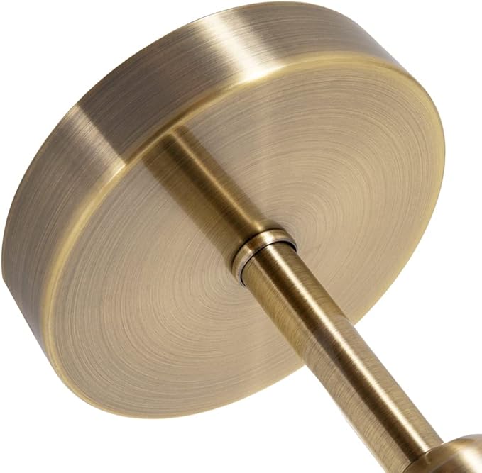 Close-up of a gold door handle on a white background