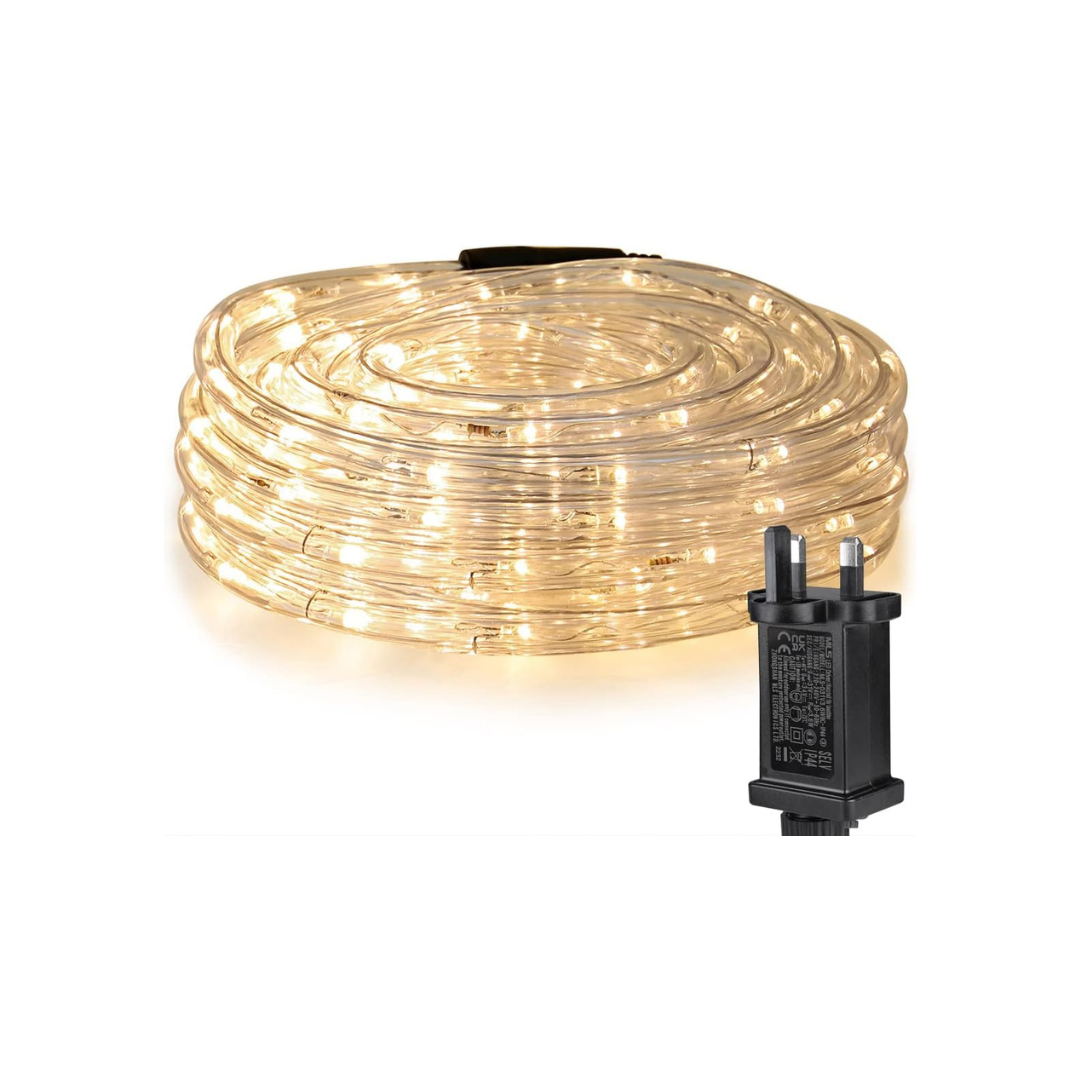 Coiled LED light strip with a plug on a white background