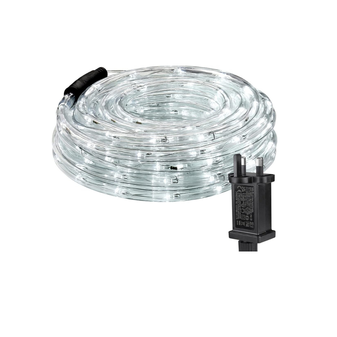 Coiled LED light strip with plug on a white background