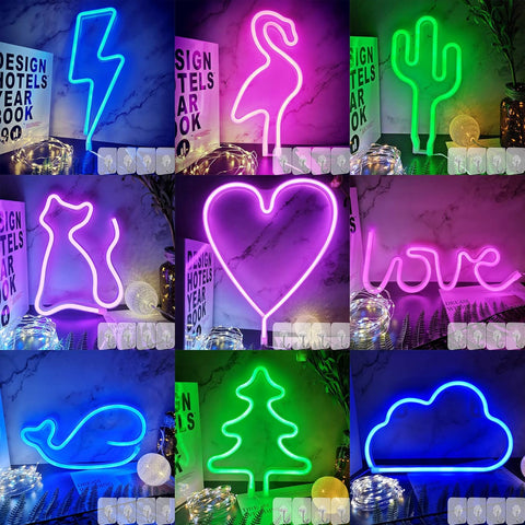Collage of various neon signs with different shapes and colors on a marble background.