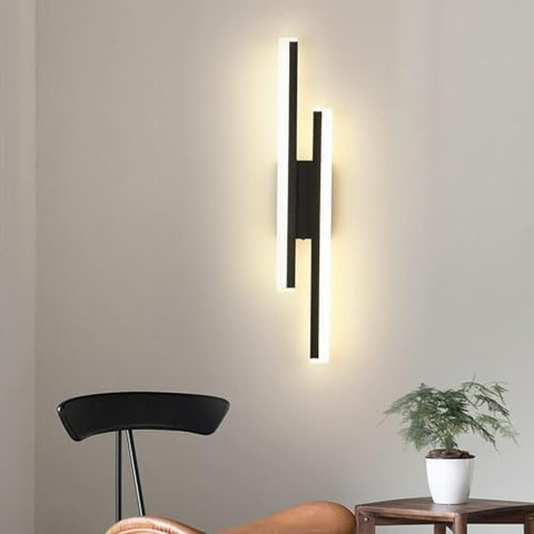 Close-up of acrylic LED wall sconce showing its minimalist design