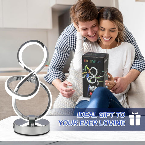 Couple with a wrapped gift and EIDEARAY product in a kitchen setting