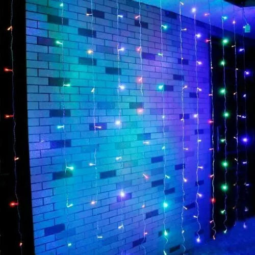 Waterproof curtain lights hanging on a fence

