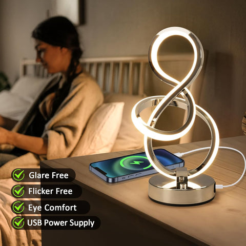 Decorative lamp with USB power supply on a nightstand, with a person sitting in the background.