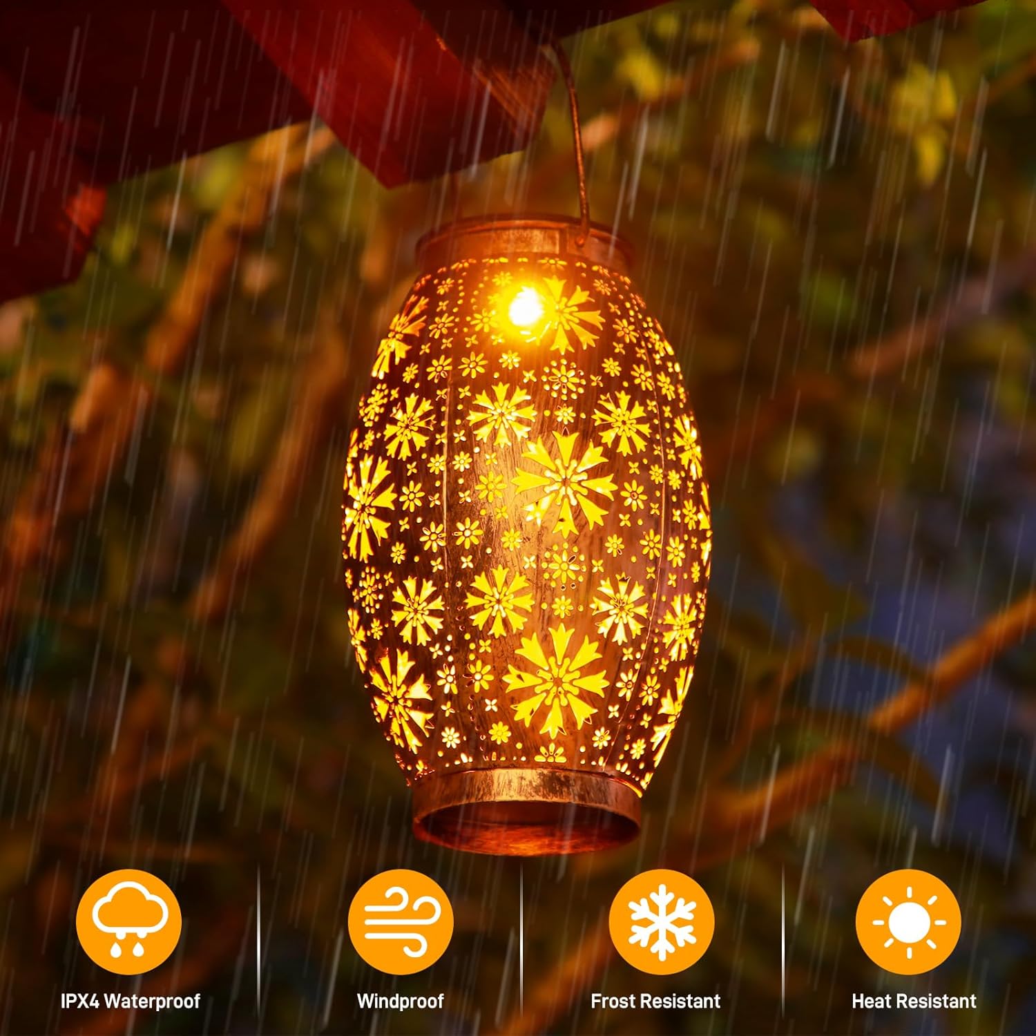 Decorative lantern with floral pattern hanging outdoors in rain, featuring IPX4 waterproof, windproof, frost resistant, and heat resistant icons.