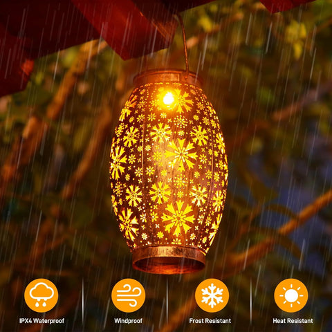 Decorative lantern with floral pattern hanging outdoors in rain, featuring IPX4 waterproof, windproof, frost resistant, and heat resistant icons.