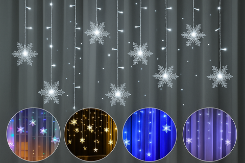 Decorative string lights shaped like snowflakes on a dark curtain background.
