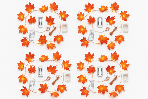 Decorative string lights with leaf patterns on a white background